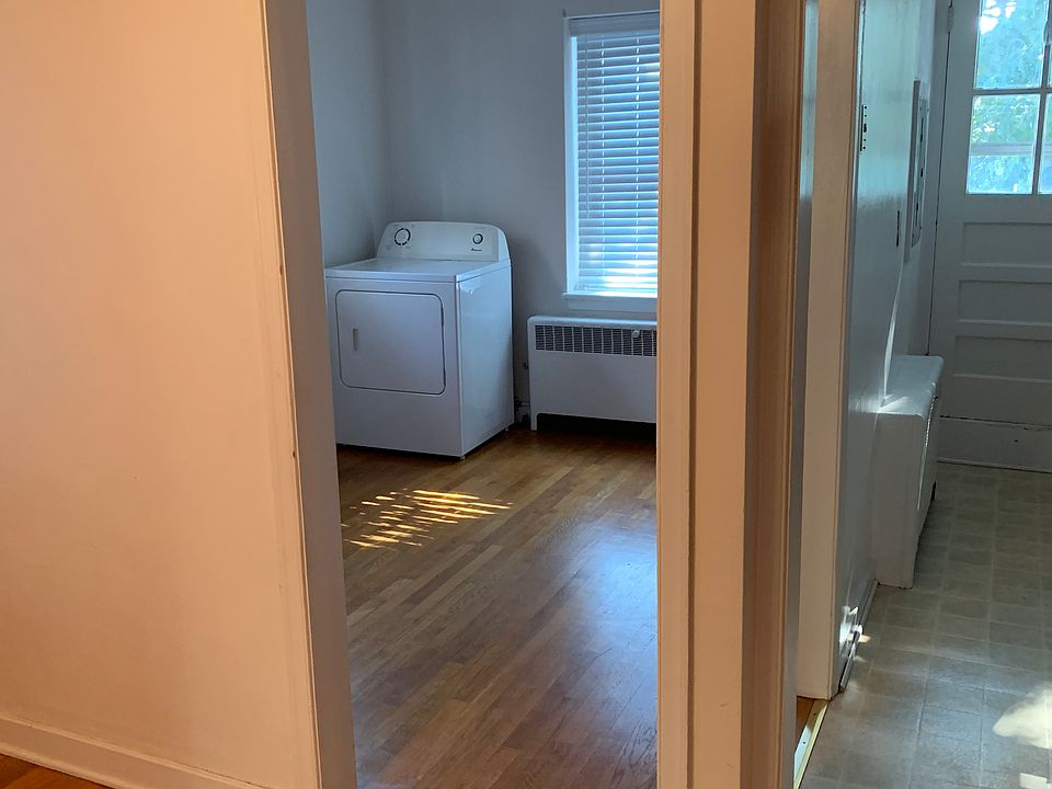 View from living room to dining room ((left) and kitchen (right)