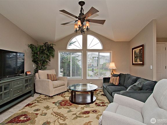 Living room with vaulted ceilings>