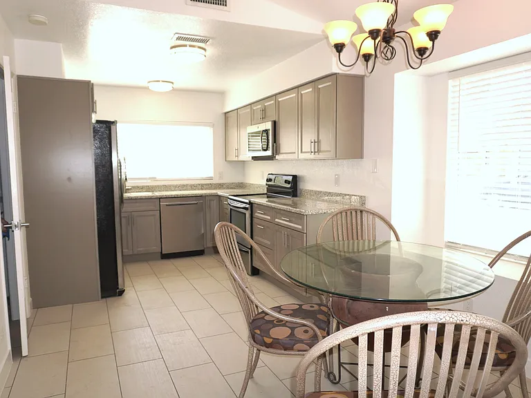 kitchen, unaltered. Furniture does not convey with rental.