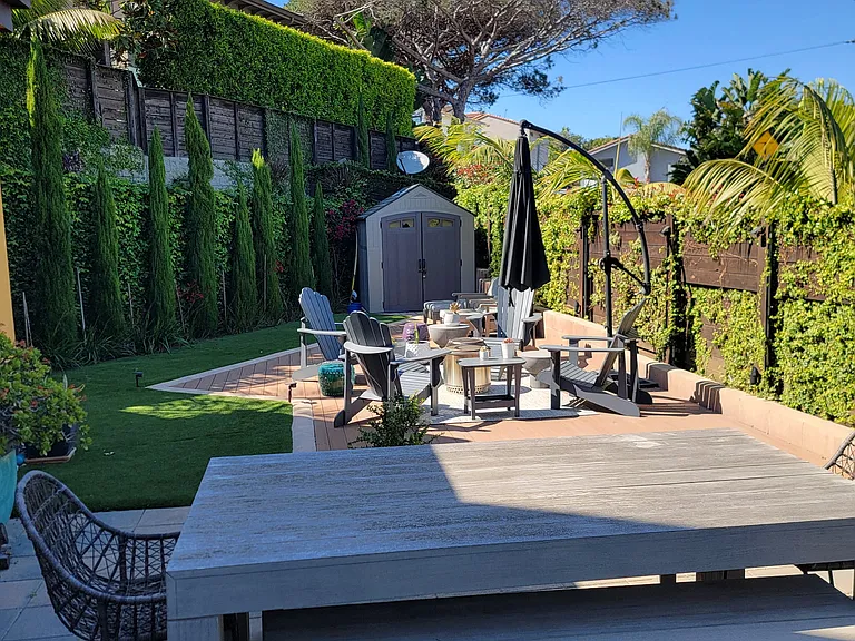 Backyard, with hardscape, deck and turf