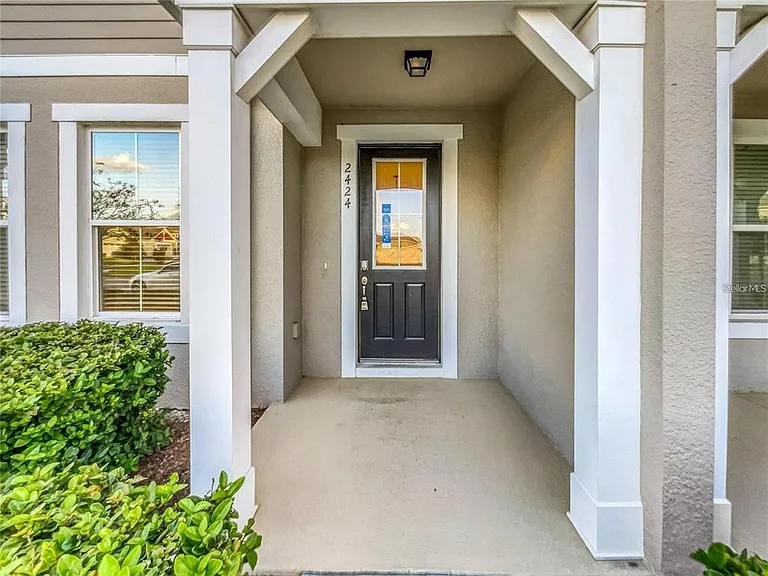 2424 Blowing Breeze Ave — Photo 2