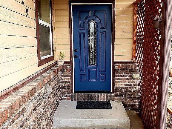 Front door, covered porch