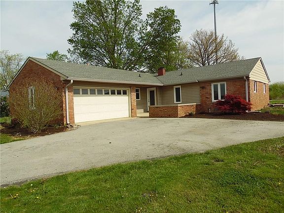 Side load 2-car attached garage and BIG driveway with LOTS of room for turnaround and parking!