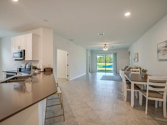 Tile floors in Dining Room, Living Room, Study/Office, Kitchen, and Gen-Suite Additional Living Room and Kitchenette!