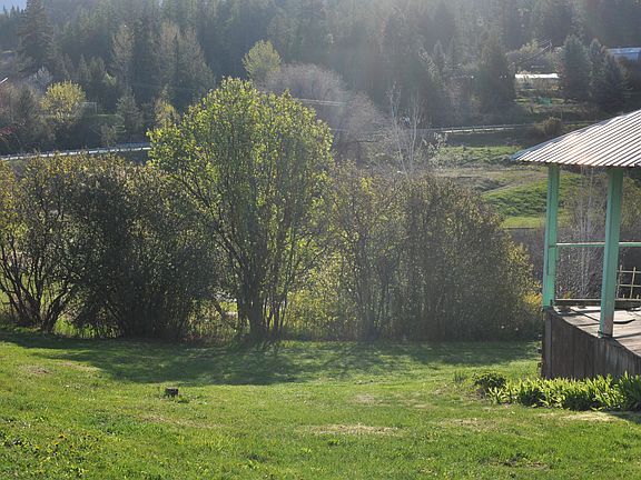 Side yard leads to orchard