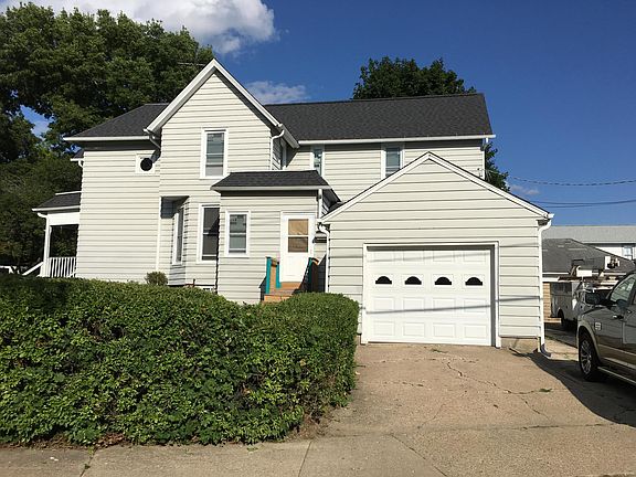 Attached garage. Outside parking for two cars.