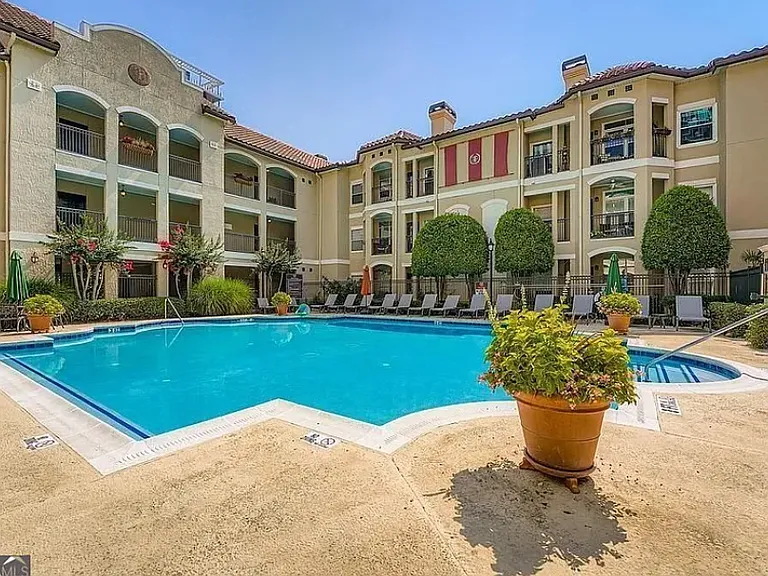 Gated swimming pool in central courtyard. Respectful, friendly community with an active HOA to create a positive communal living environment.