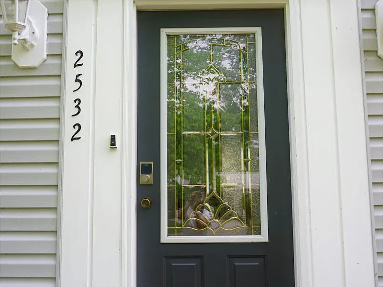 Front door with electronic deadblot