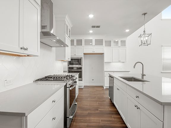 Kitchen with upper glass cabinets