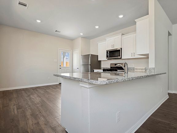 A breakfast bar in the kitchen
