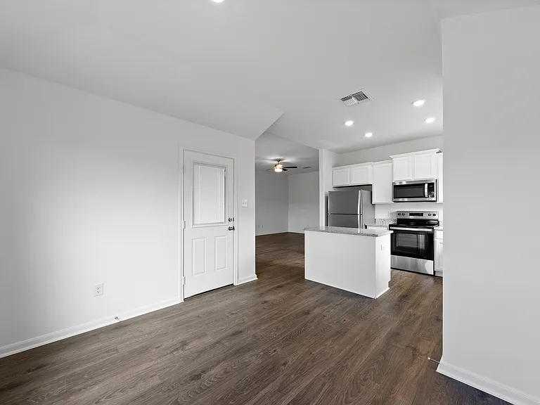 Dining room with a door to the covered patio.