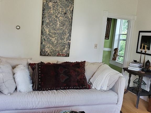 The stairs to second floor are off the living room