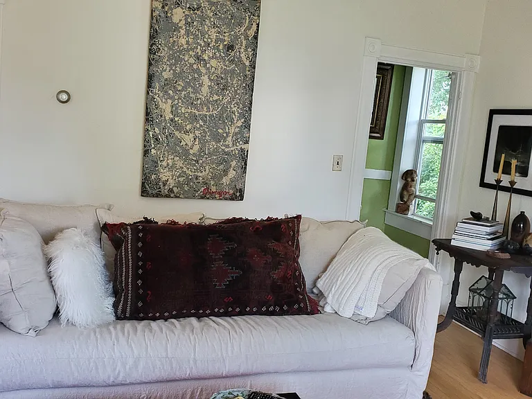 The stairs to second floor are off the living room