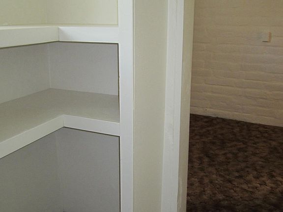 Built-in shelves in the walk-in closet