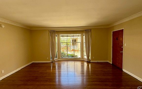 Main Living Space w/ Shiny Hardwood Floors