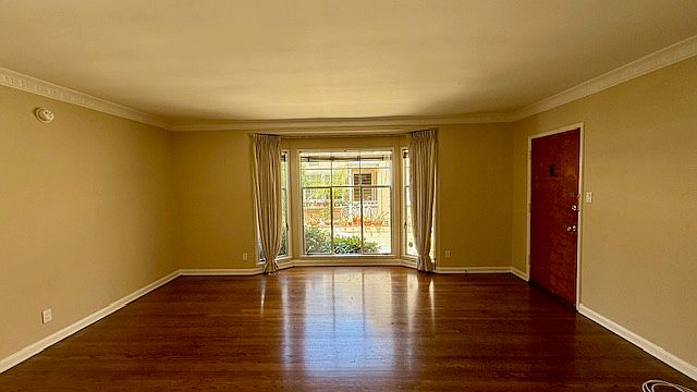 Main Living Space w/ Shiny Hardwood Floors