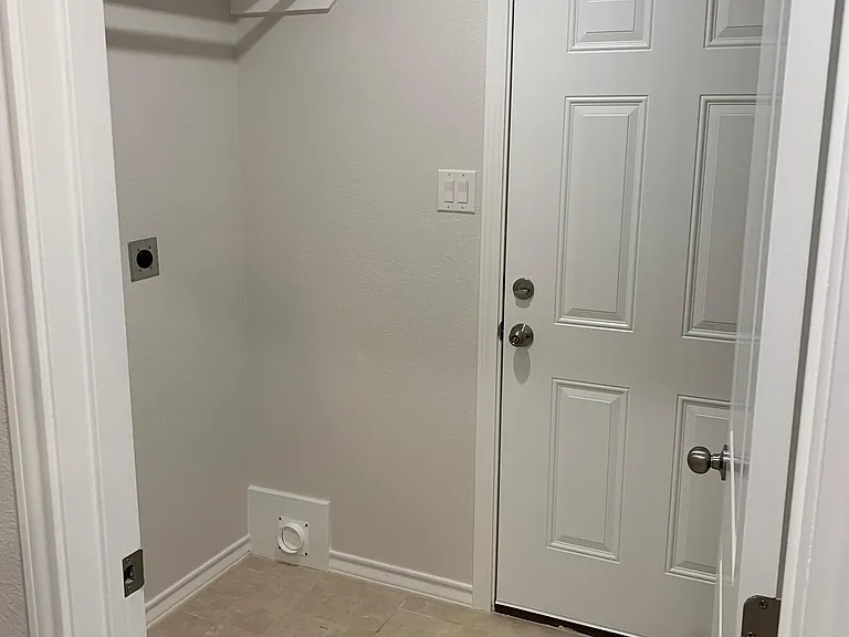 laundry room, and side entrance to back yard