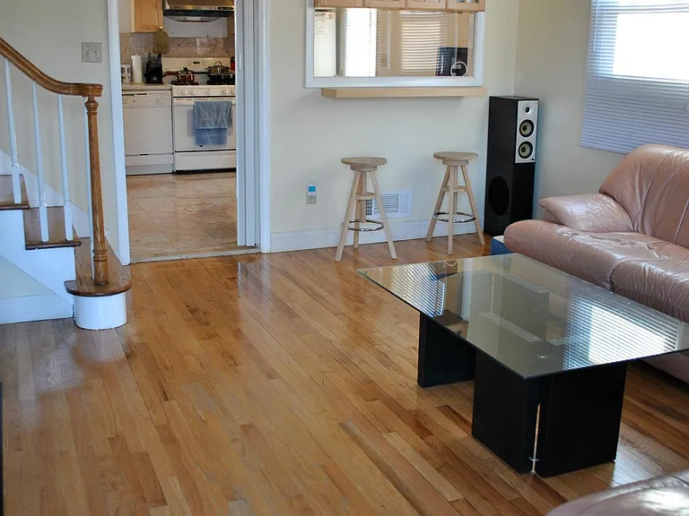 Living Room W/ Hardwood Floor and Recess Lighting