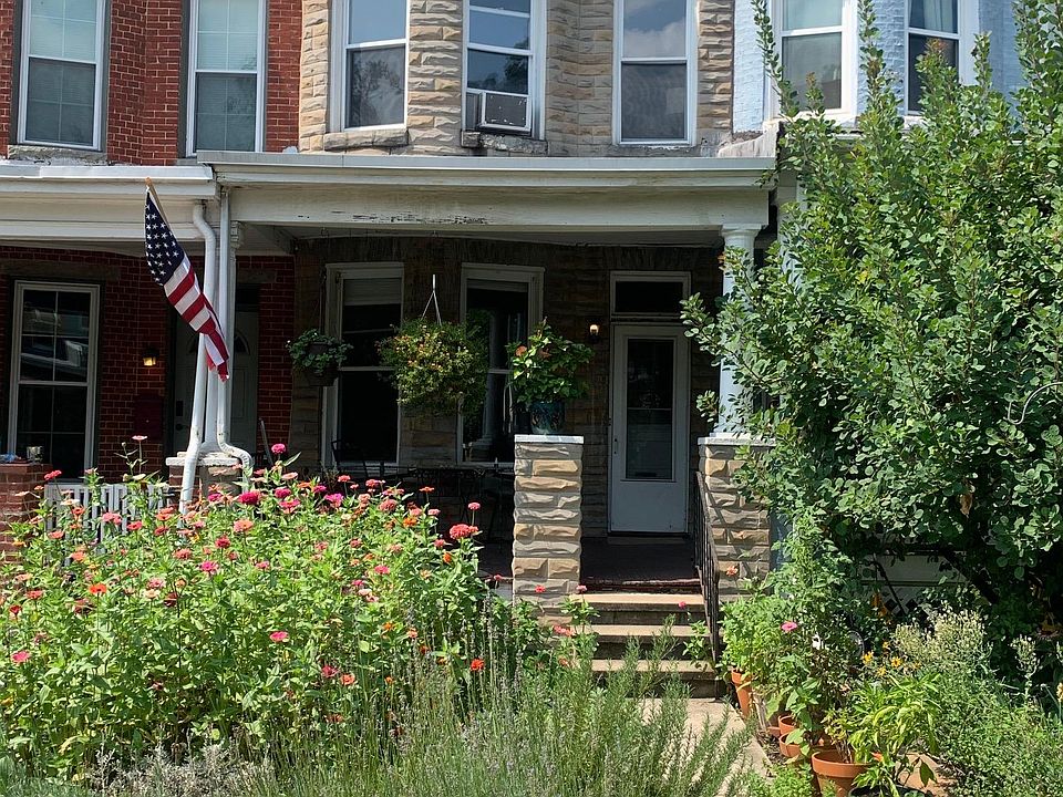 Front entrance (middle), with beautiful cottage-style garden