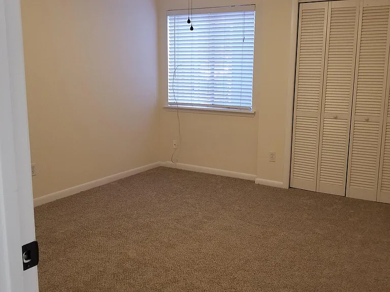 First bedroom with new carpet