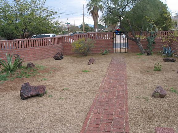 Large fenced front yard