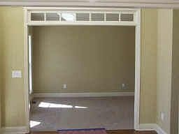 Transoms above doorways in formal living room and dining room