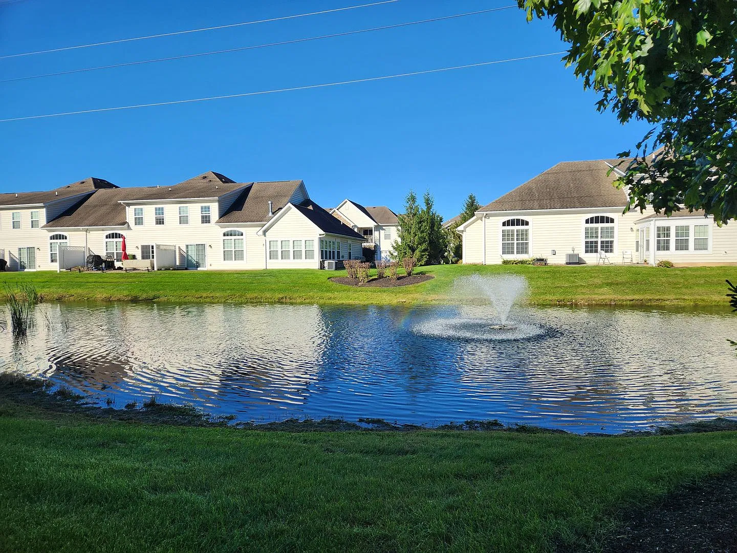 Available Now!3 BR/2.5BA Water View Condo with a 2-Car Garage and Community pool! — Photo 1