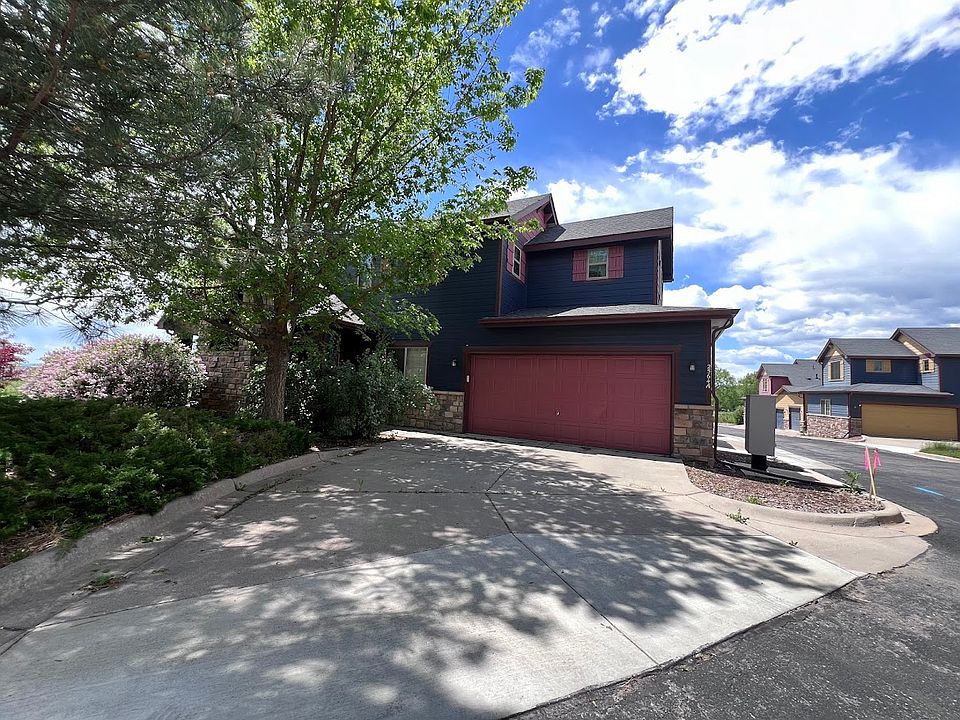 Spacious ground unit with an attached two car garage and driveway!