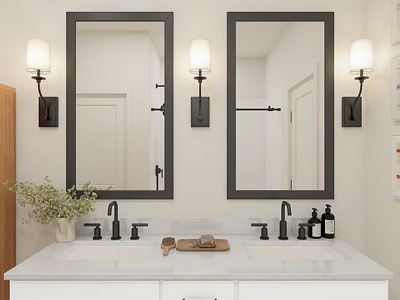 Primary bath with freestanding vanity and matte black fixtures