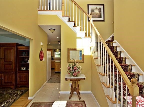 The spacious entry foyer welcomes you into this wonderful home.