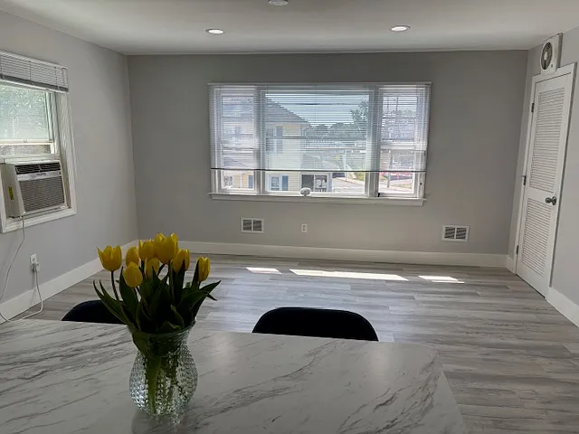 Island opens to sunny living room