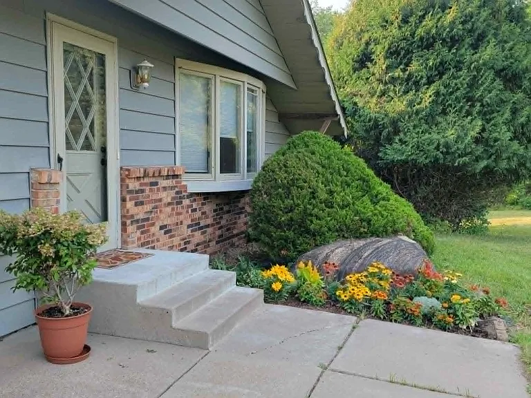 Sweet little flowering garden greets you at the front door.