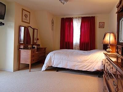 Large Master suite with full bathroom, walk-in closet, and lovely French doors leading out to your o