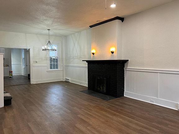 Open layout living room leading to dining room