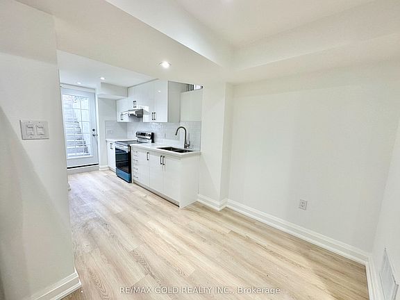 5th image of 7099 Village Walk #Basement