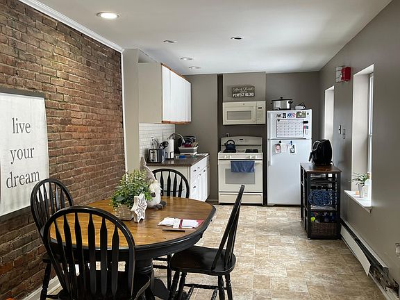 Kitchen layout can accommodate a full size kitchen/ dining table
