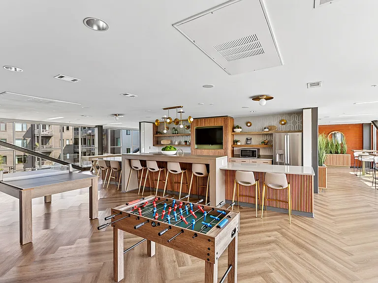 Clubroom with foosball, pool table, ping pong table, and games!