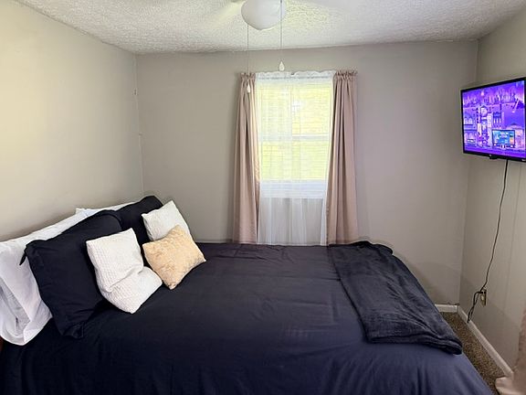 Front bedroom with TV