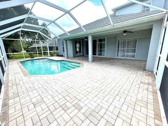 Oversized paver patio room for table and chairs, sofa and table , lounge chairs