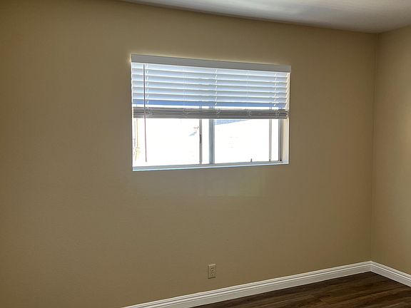 Spacious bedroom all new tiles, new blinds, and large closet