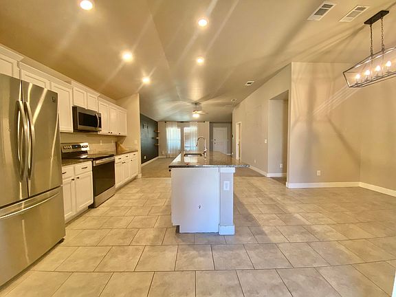 4th image of 10403 Xenia Ave