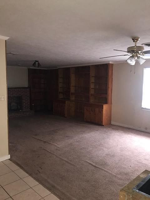 This area is right off the kitchen, dinning area or additional sitting area with fireplace.