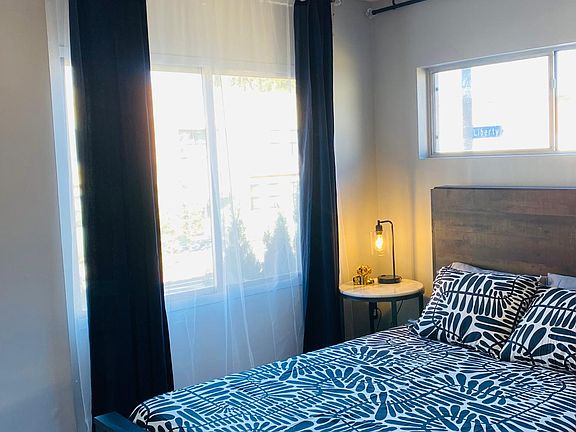 Lots of lighting in the master bedroom.