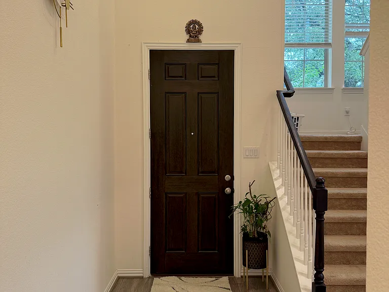 Bright entryway with staircase