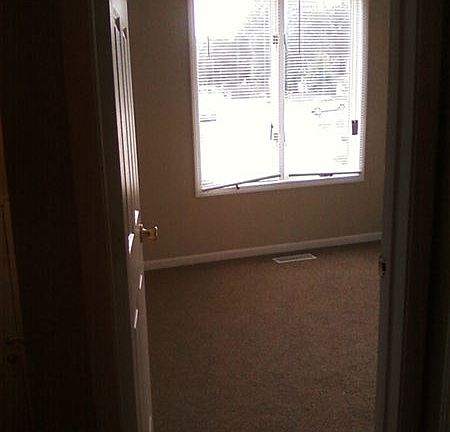 Front bedroom with new carpeting.