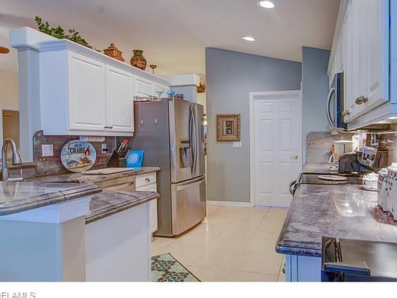 updated kitchen granite, stainless steel appliances.