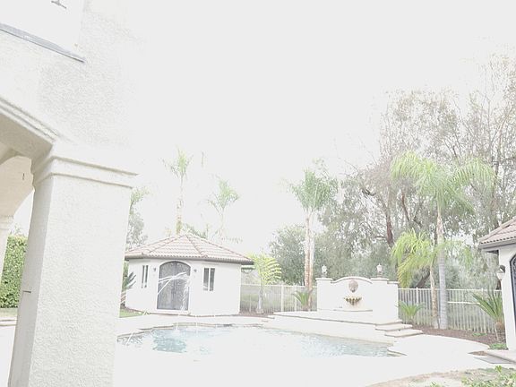 Facing east side cabana with kitchen and bathroom