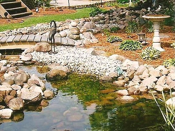 SMALL KOI POND WITH WATERFALL
