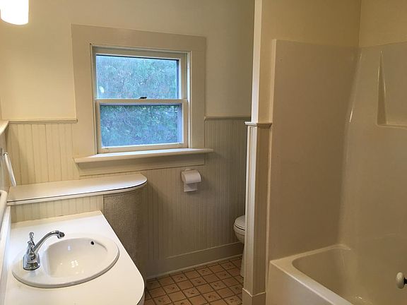Updated large bathroom with tub and shower