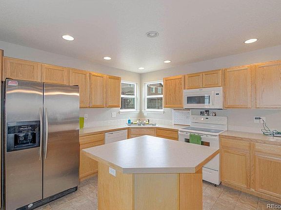 Kitchen with Island and backyard access